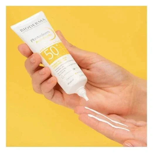 Bioderma Photoderm Aquafluide SPF 50+ tinted sunscreen bottle for high UVA/UVB protection and natural glow
